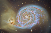 Las galaxias acompasan su rotación con el movimiento de las galaxias vecinas