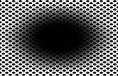 ¿Por qué esta ilusión óptica te hace ver un agujero negro en expansión?
